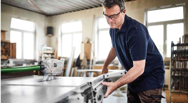 a man using a circular saw