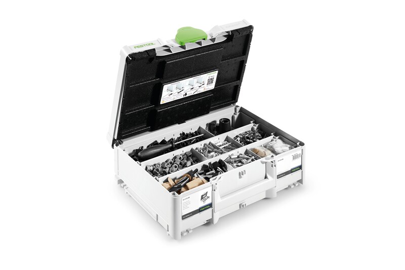 A white Festool storage box with an open lid, revealing various organized compartments filled with small hardware items, screws, and connectors. The box has a green handle and a label inside the lid.