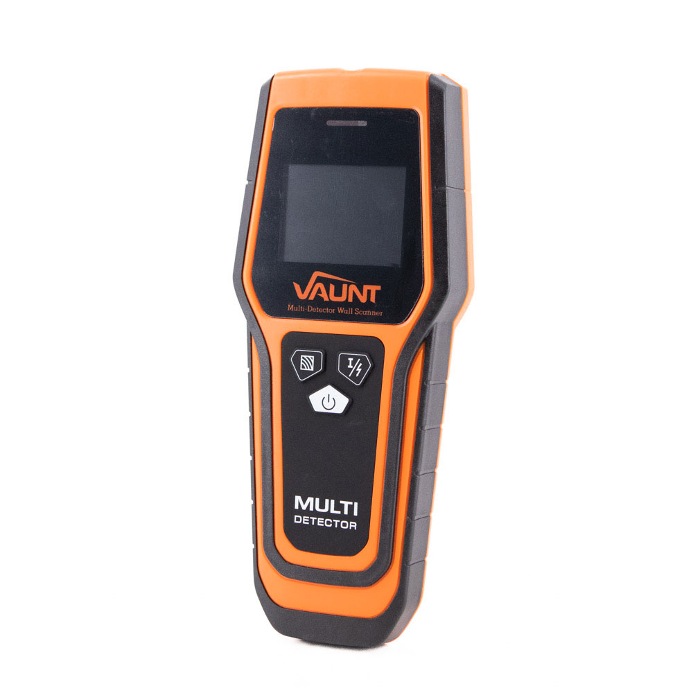 A handheld electronic multi detector with an orange and black casing, labeled VAUNT and MULTI DETECTOR. The device has a screen, two buttons, and a lightning bolt symbol on the front.