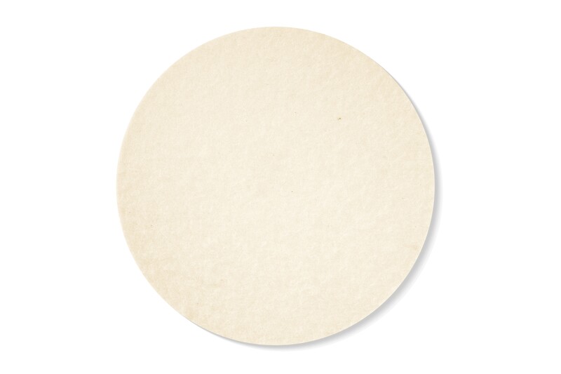 A plain, round, beige paper circle set against a white background, resembling a blank coaster or filter.