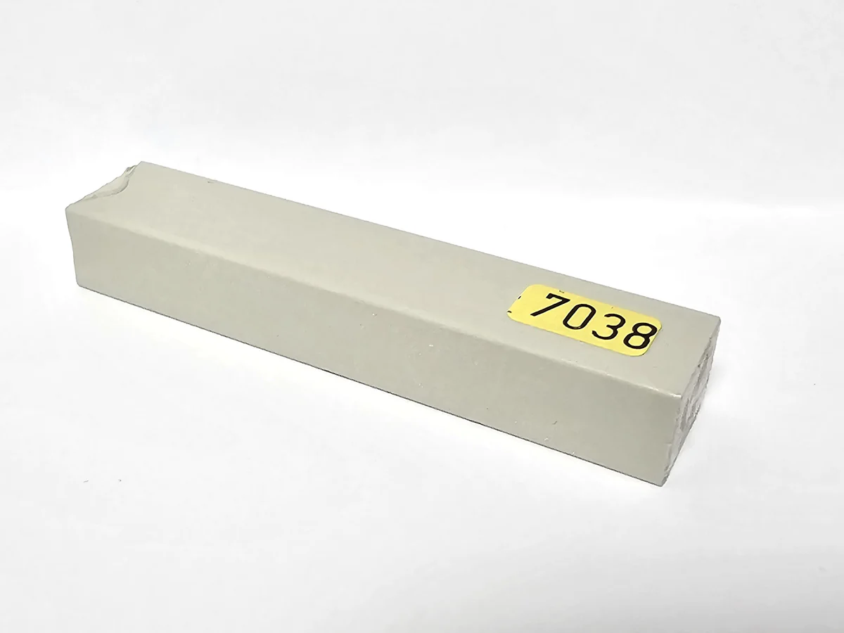 A rectangular white box rests on a plain surface—it's the Konig 8cm Hard Wax Filler Stick 142 Medium Oak, Single.