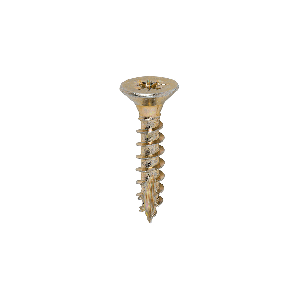 A single gold-colored flat-head wood screw with a Phillips drive stands upright against a plain white background.