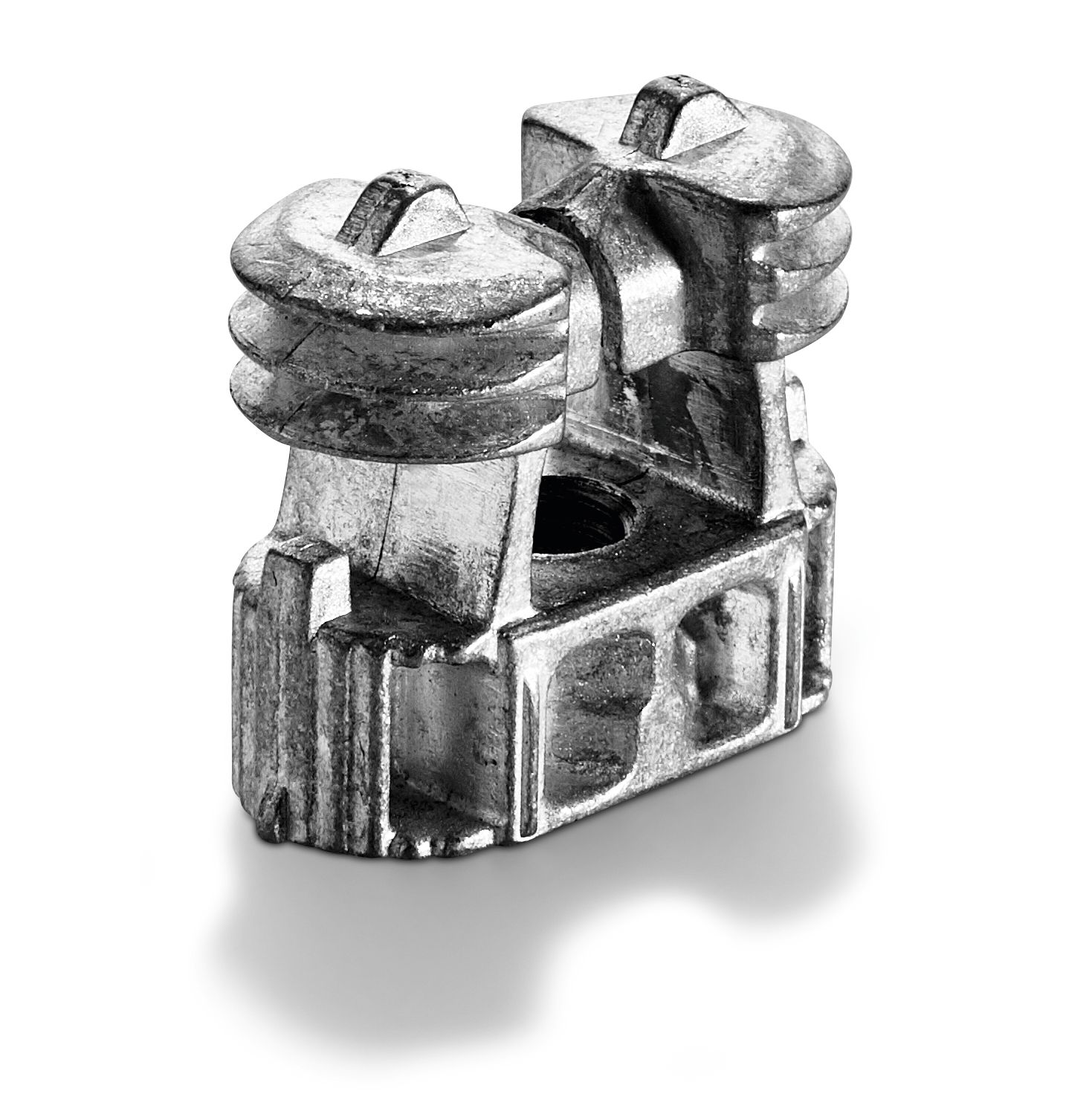 A close-up of a metal cam lock fitting for flat-pack furniture assembly, displayed on a white background with a shadow below.