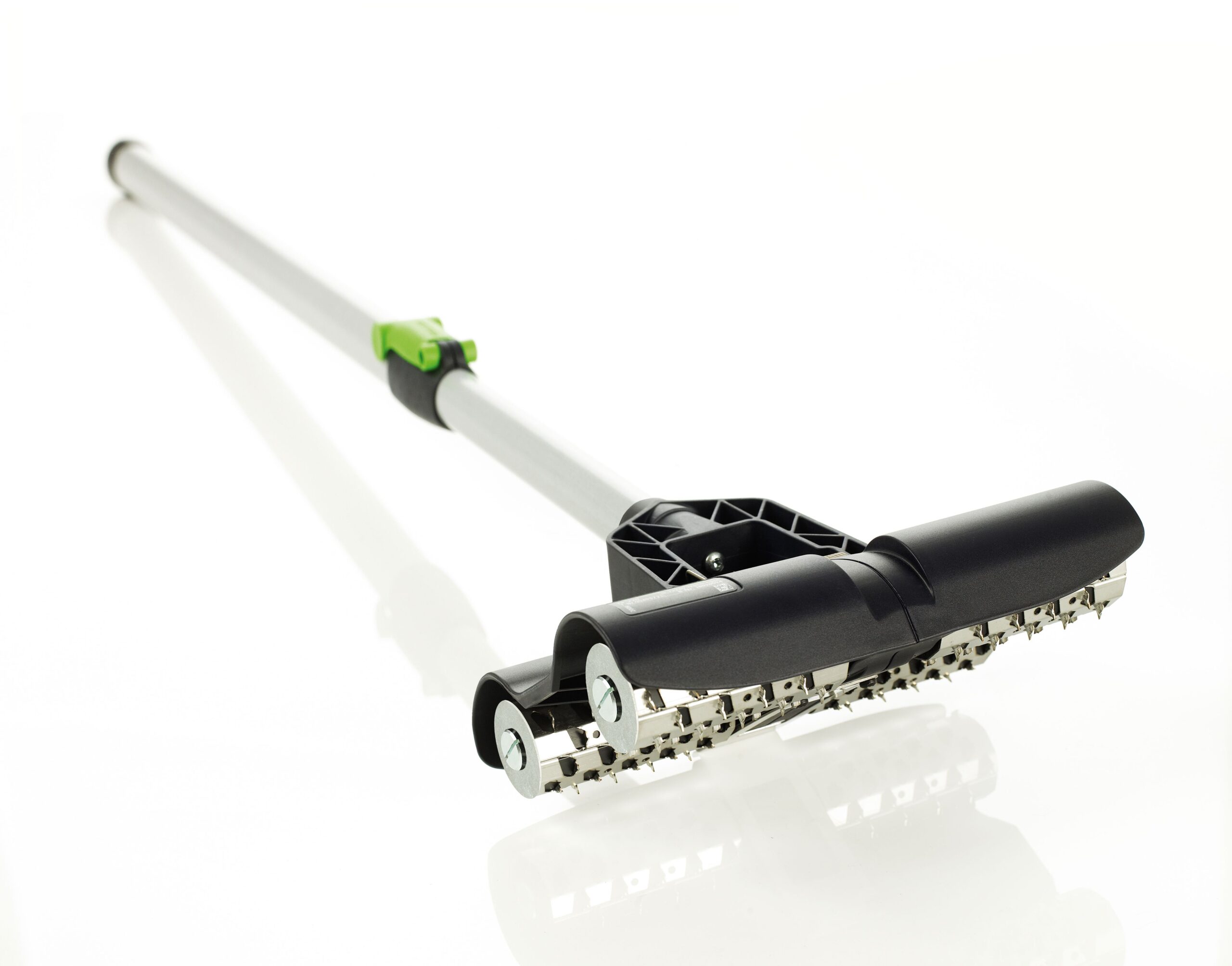 A close-up of the Festool 495747 Wallpaper perfo TP 220 with a metal and plastic build, long handle, dual rollers on white background.