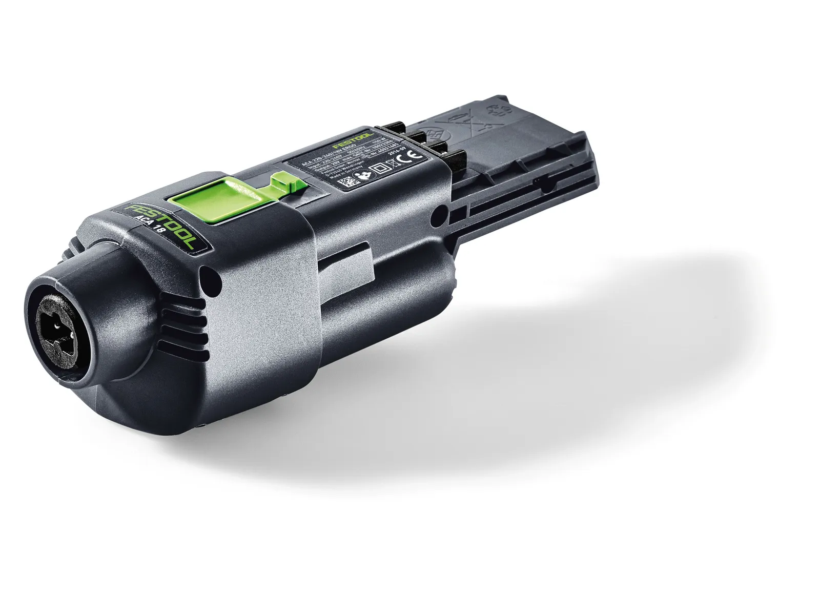 A compact black and gray cordless power tool with a green button, textured grip, and cylindrical front attachment on a white background.