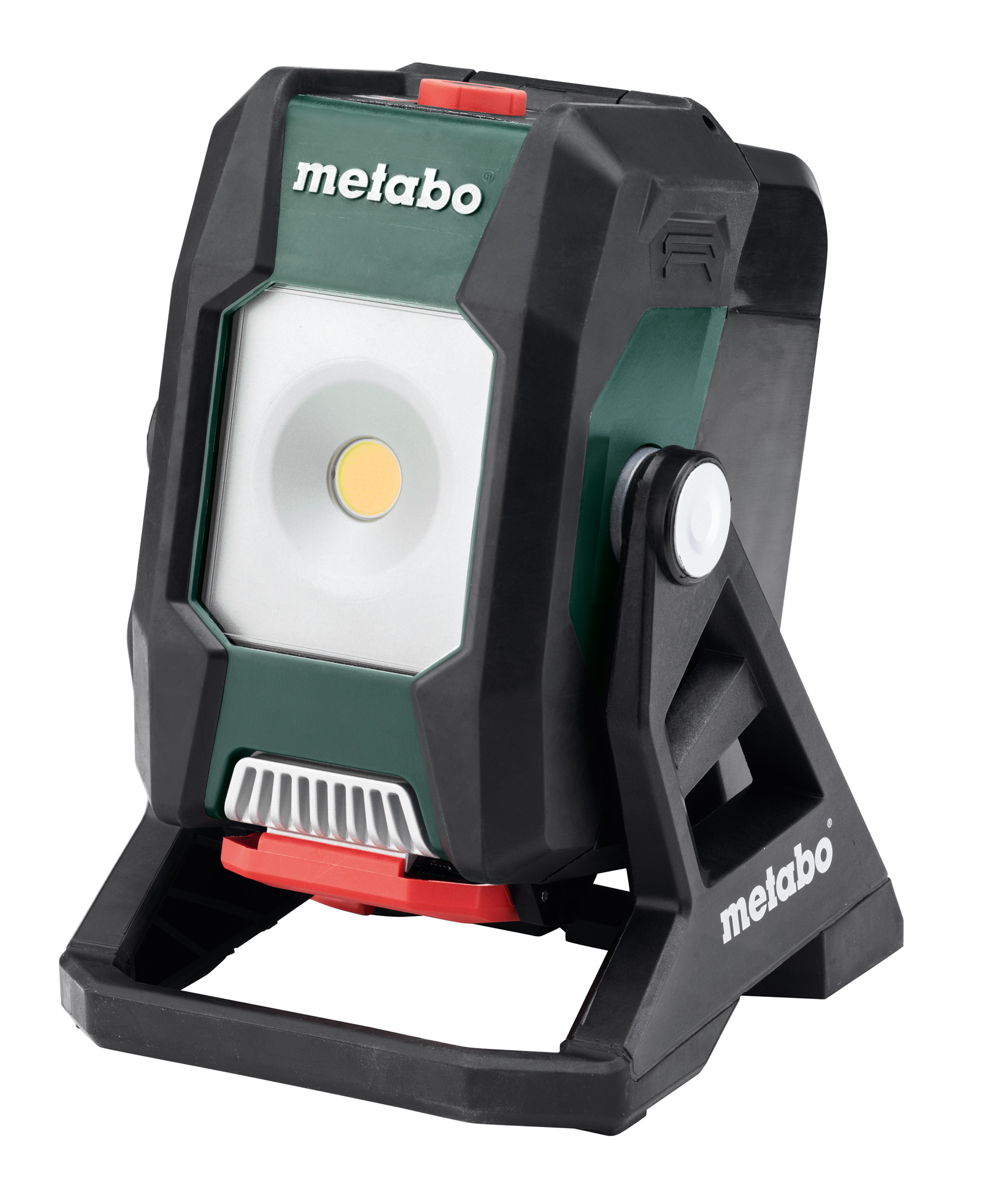 A portable Metabo LED work light with a green and black rugged casing on an adjustable black stand, circular light at the center.