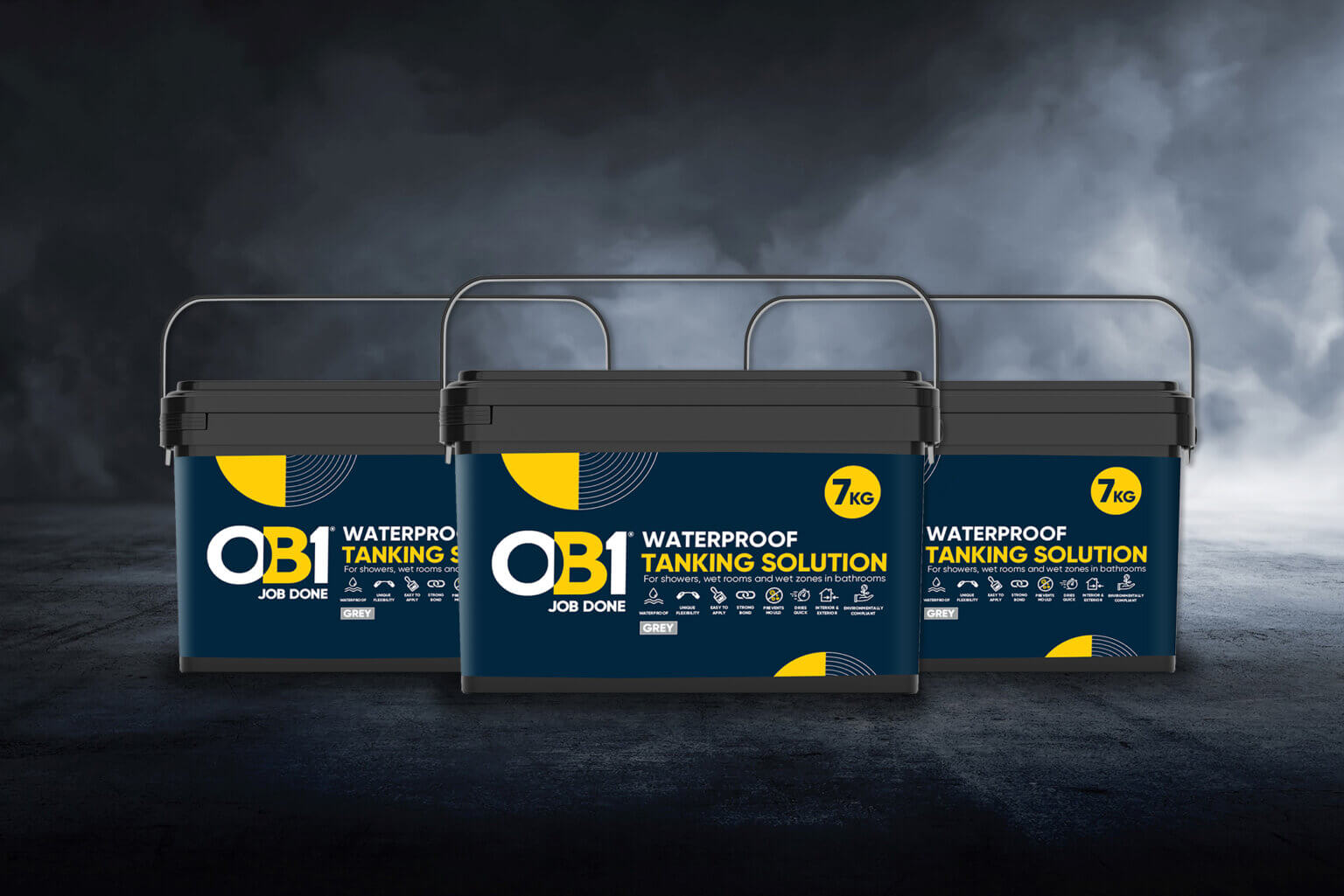 Three black OB1 paint and varnish remover cans sit side by side on a dark textured surface with a moody background.