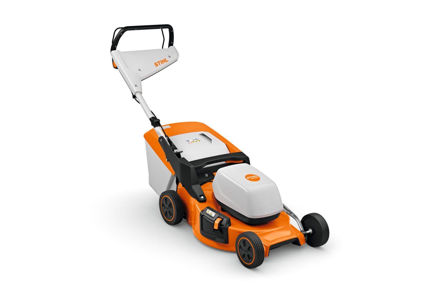 The Stihl RMA 253.3 (AK) lawnmower features orange and white colours, a grass bag, four wheels, and a push handle in white.