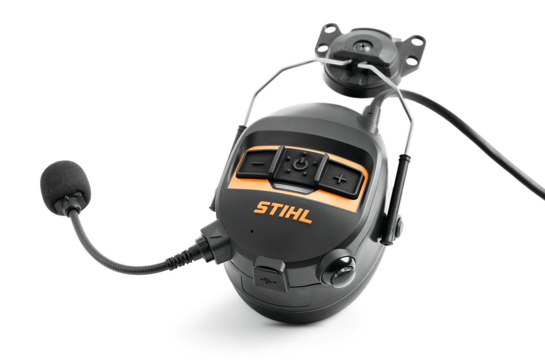 The Stihl ADVANCE PROCOM Ear Defenders - Headband Version have a black design, microphone, controls, adjustable band, and USB port.