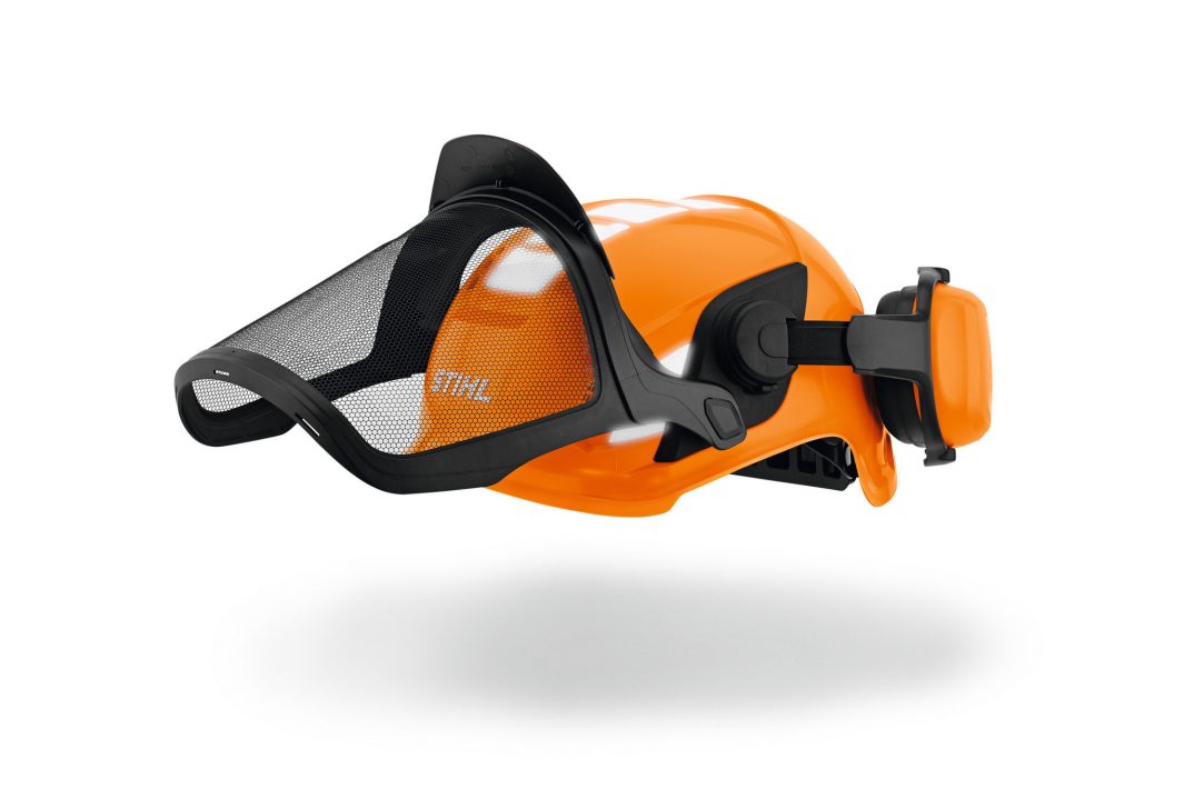 The Stihl Helmet ADVANCE X-Vent has an orange shell, black mesh face shield, and adjustable ear muffs for protection and comfort.