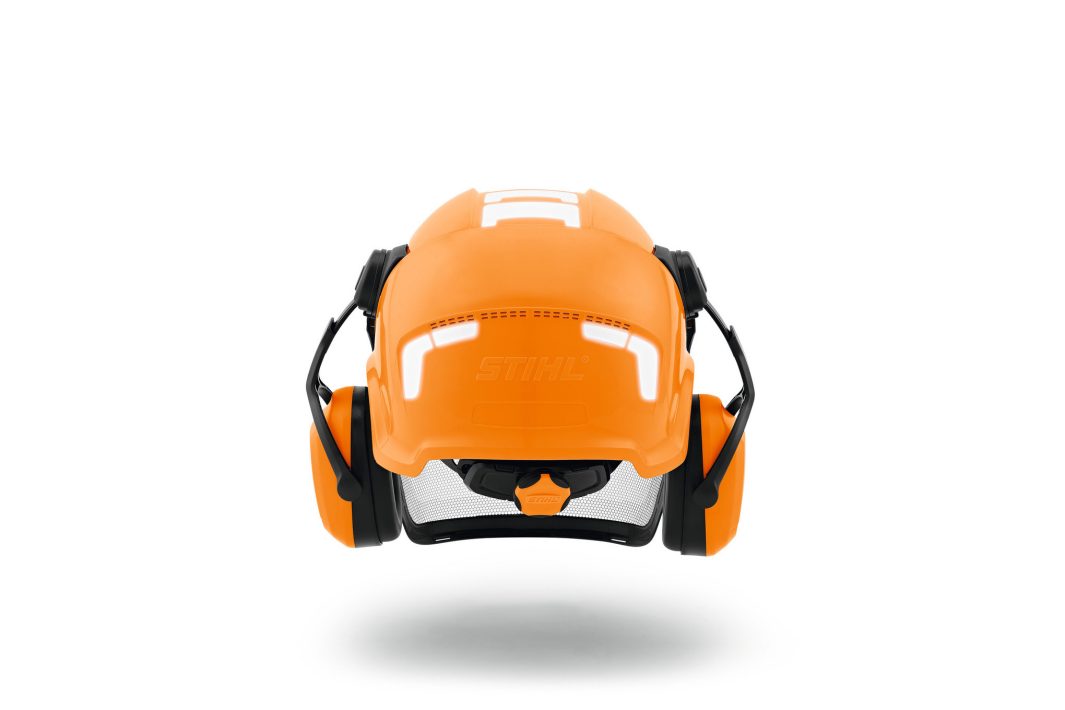 The Stihl Helmet ADVANCE X-Vent is shown from the front with ear defenders and a mesh visor, offering protection and comfort.