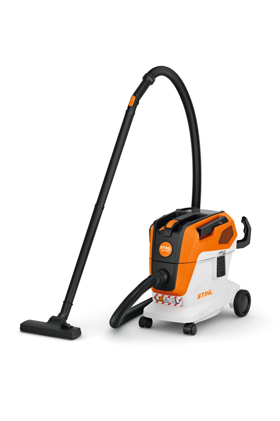 The Stihl SEA 100.0 (AP) Vacuum Cleaner has an orange and white body, black hose, long handle, wheels, and visible Stihl logos.