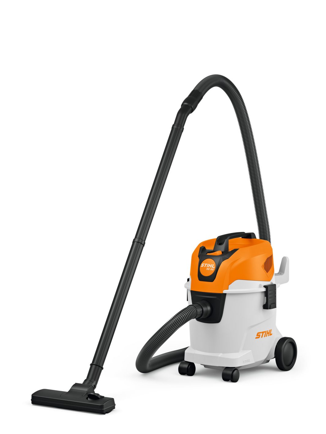 The Stihl SE 33 Vacuum Cleaner features an orange and white body, wheeled base, and a black hose with a flat floor nozzle.