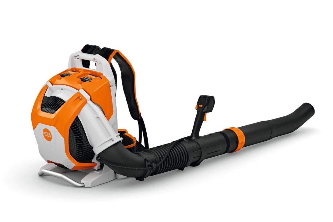 The Stihl BRA 600.0 (AP) Backpack Blower has an orange and white motor housing, black hose and handle, and padded shoulder straps.