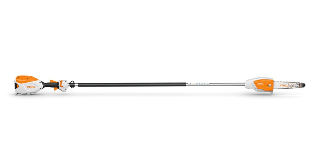 A long pole pruner featuring an orange and white motor housing on one end and a small chainsaw blade for trimming high branches.