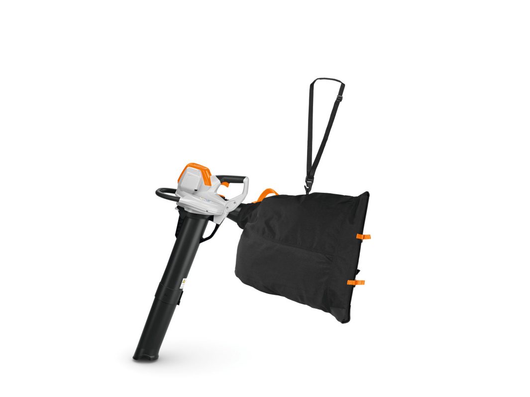 A cordless electric leaf blower and vacuum with a black collection bag and shoulder strap, set against a white background.
