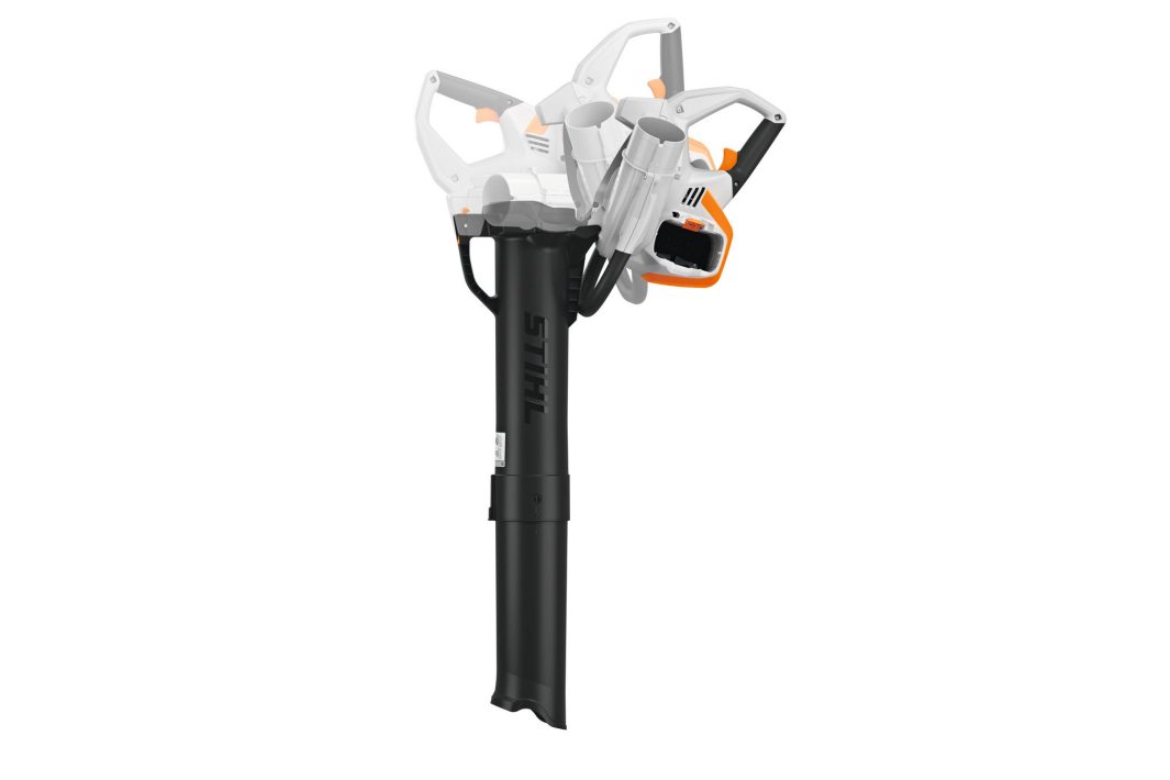 A white and orange STIHL leaf blower and vacuum with a large black collection tube, shown against a plain white background.
