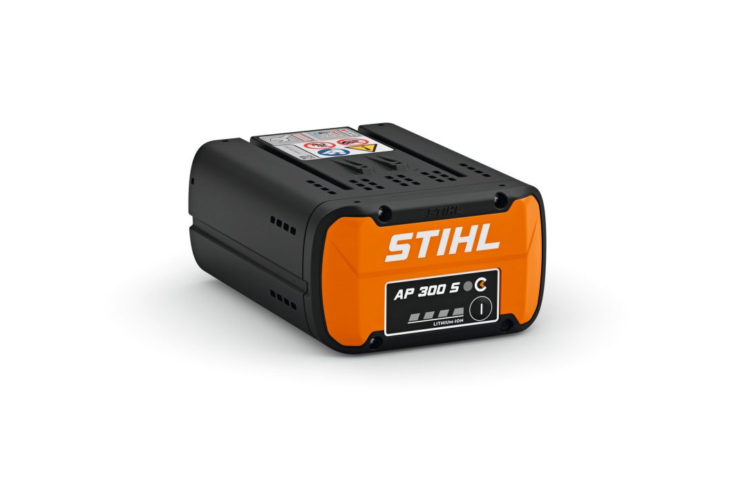 A black and orange STIHL AP 300 S lithium-ion battery with indicator lights and branding, set on a white background.