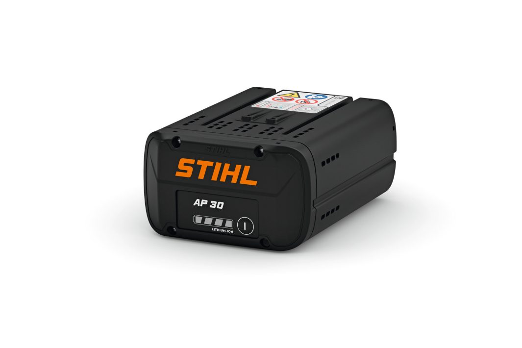 A black STIHL AP 300 lithium-ion battery with an orange logo, control panel, and indicator lights on a white background.