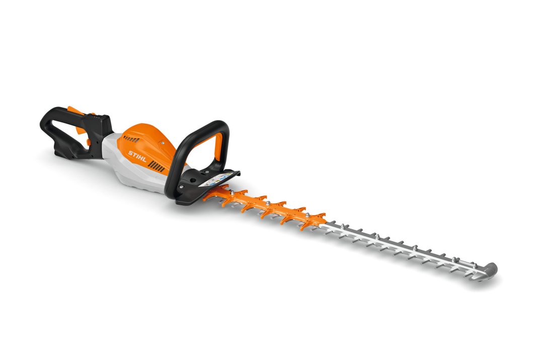 The Stihl HSA 130 R (AR) Hedgetrimmer features an orange and white body, black handle, and long silver blade with orange guards.
