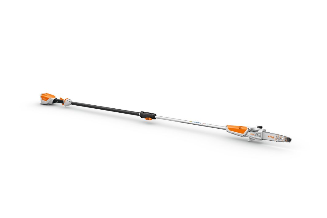 The Stihl HTA 50 Pole Pruner KIT has an orange and white body, black extendable pole, compact chainsaw blade, and battery compartment.