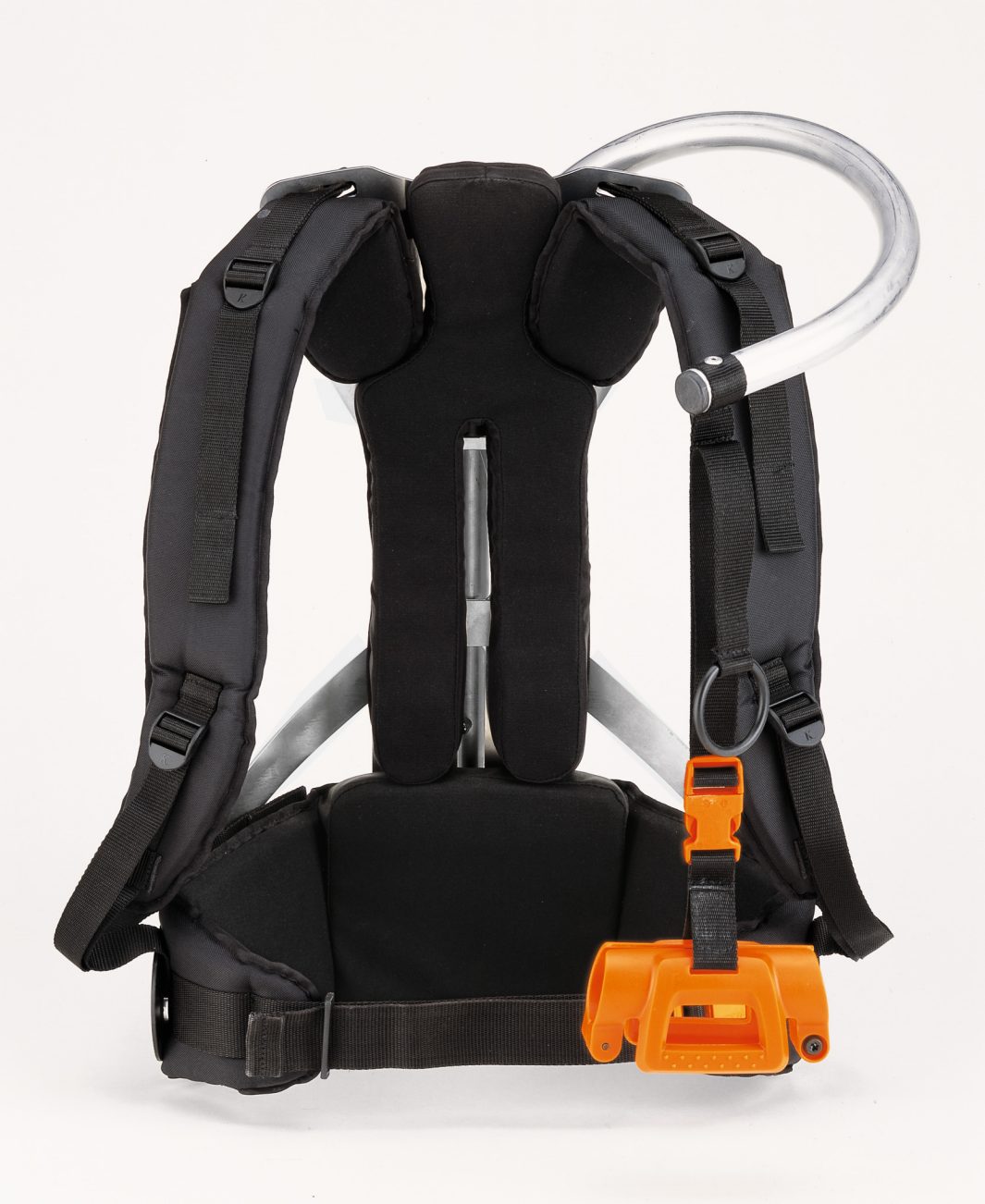 A black and silver rucksack-like harness with thick padded straps, a curved metal tube, and a bright orange device at the front.