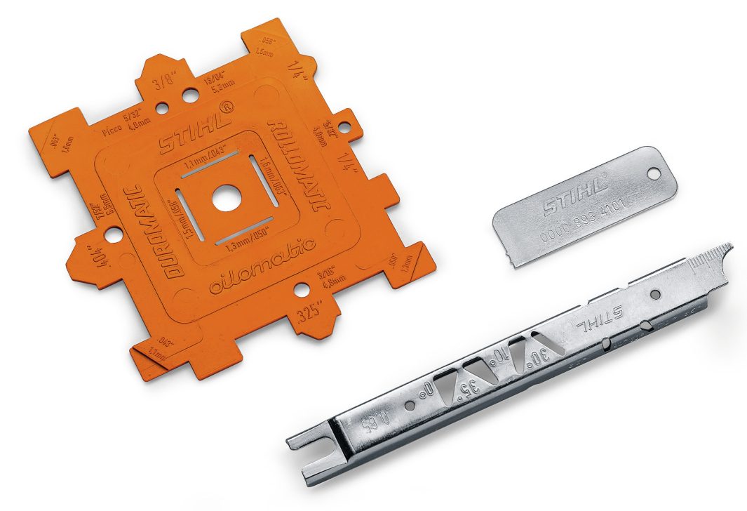 Three Stihl-branded chainsaw maintenance tools: an orange multi-purpose gauge, a metal depth gauge, and a silver chain breaker on white.