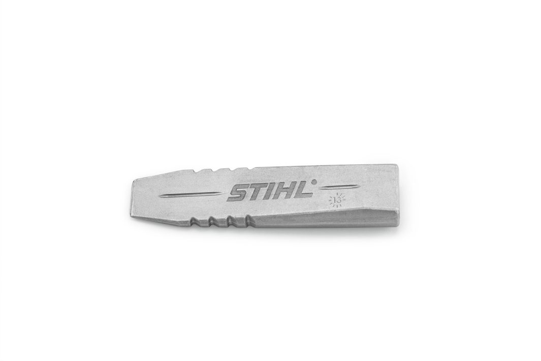 A silver metal felling wedge with ridges, shown on a white background, is ideal for use with the Stihl AX 30 C Cleaving hammer.