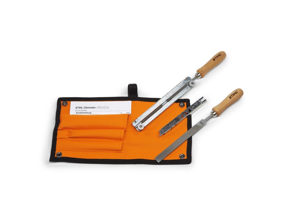 An orange tool roll with a metal chainsaw file guide and flat file, both with wooden handles, partially out of the pouch.