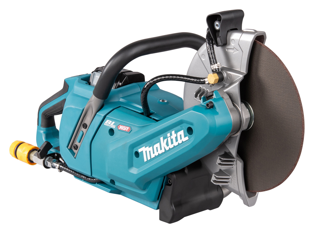 A teal Makita handheld electric cut-off saw with a circular blade, black handle, various controls, and attached hoses.