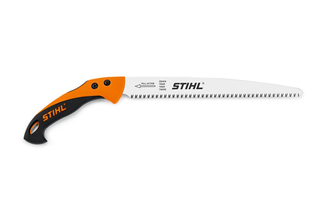A Stihl hand saw with a curved silver blade and orange-and-black ergonomic handle, designed for pruning, with sharp teeth on one edge.