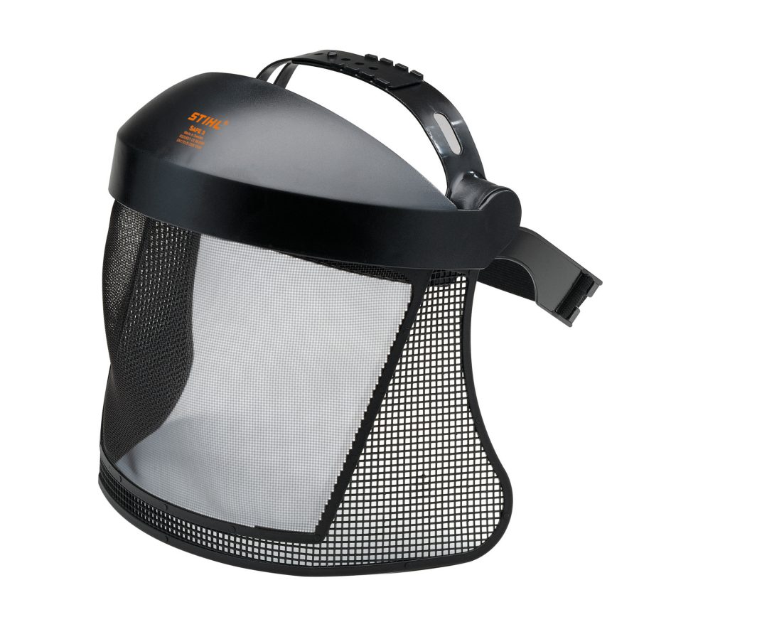 A black mesh face shield with an adjustable headband and a curved fine metal mesh visor, used for facial protection during cutting tasks.