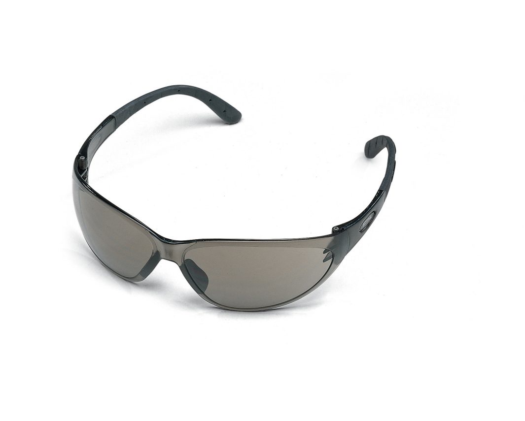 Black wraparound sunglasses with dark tinted lenses and a sleek, curved frame are displayed on a white background.