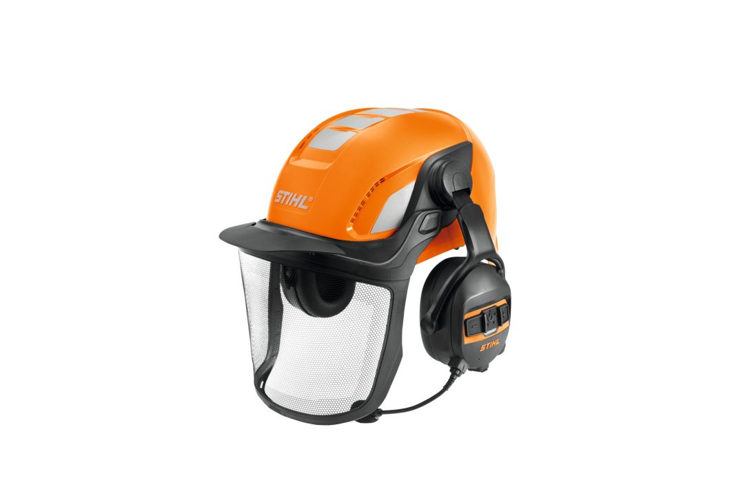 The Stihl ADVANCE X-Climb set includes an orange helmet with ear protection, mesh visor, and reflective strips for safety.