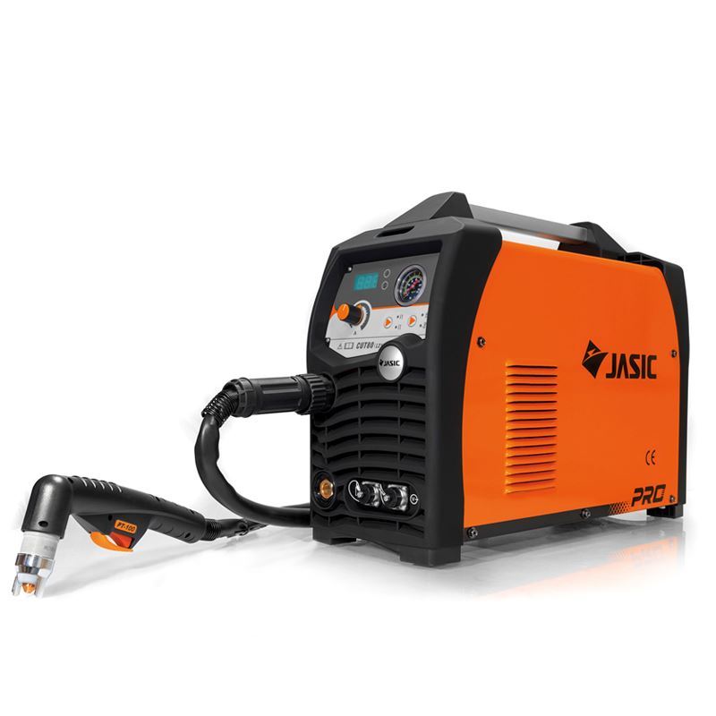 An orange and black Jasic PRO welding machine with a control panel and an attached welding torch, set against a white background.