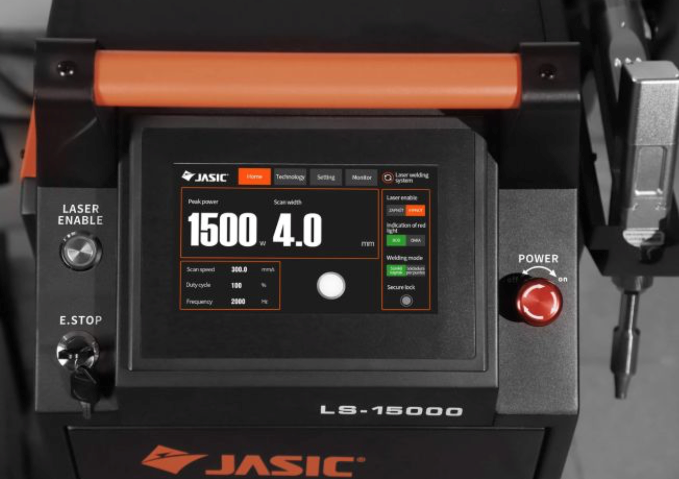 Close-up of a JASIC LS-15000 laser welding machine control panel showing settings like peak power, scan width, scan speed, duty cycle, and frequency, with a red power knob and emergency stop button in view.