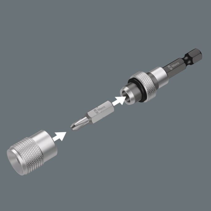 Exploded view of a metallic screwdriver bit holder with arrows showing how the cap and bit fit into the main body, displayed on a grey background.