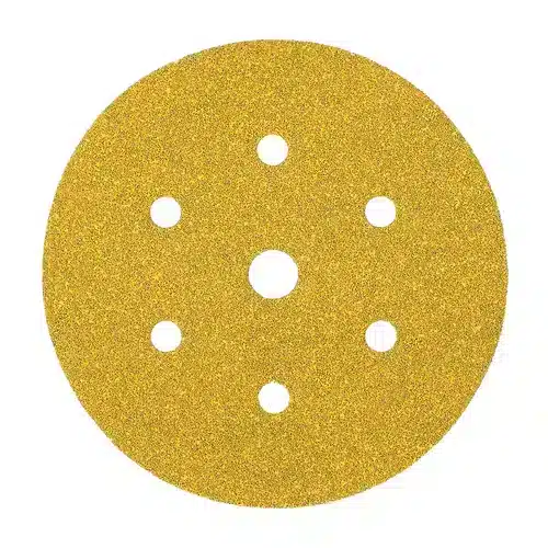 The Mirka Gold 150 mm Grip 7 Holes sandpaper disc is designed for use with power sanders, featuring one large central hole and six smaller holes. Its abrasive surface ensures efficient smoothing of various surfaces.