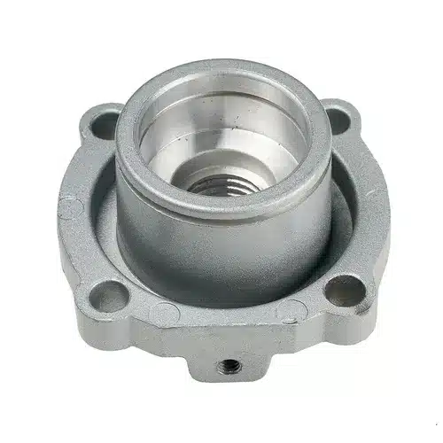 A close-up of a metal machined part with a cylindrical centre, flanged base, and four screw holes, typically used in mechanical or industrial applications—for example, as a compatible component or replacement part included in the Mirka Carbon Brush+Cap Kit No. 76+78 for Miro 955/955-S.