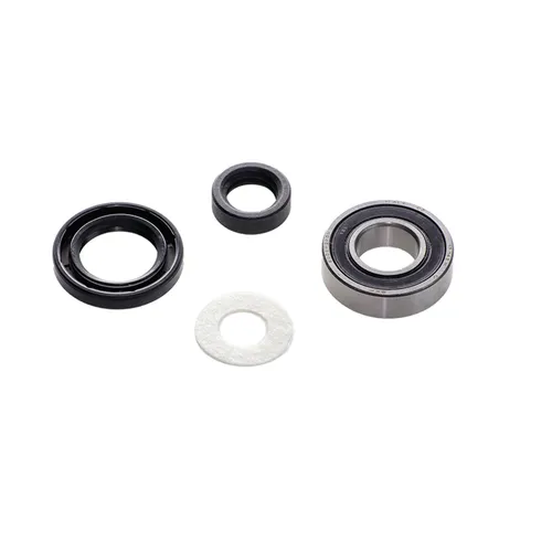 Four mechanical parts are arranged on a white background: a metal ball bearing, two black rubber seals of different sizes, and a white circular washer—resembling the components included in the Mirka Carbon Brush+Cap Kit No. 76+78 for Miro 955/955-S.