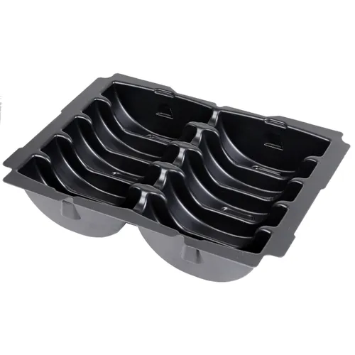 Black plastic ice ball mould tray with six semi-spherical cavities, designed to create large round ice cubes for drinks. The tray features rectangular edges and individual moulds separated by raised dividers.