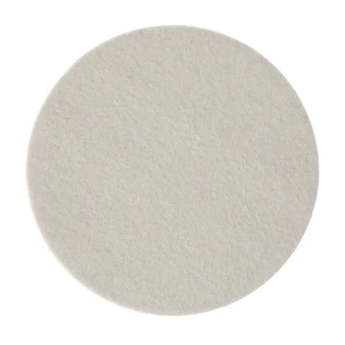 A plain, round, white cleaning pad with a soft, felt-like texture, viewed from above on a white background.