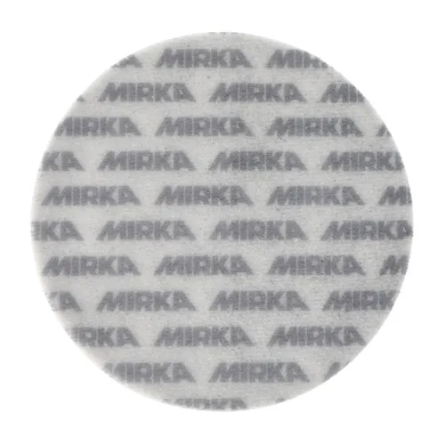 A round, white disc that appears to be made from a thin, textured abrasive pad or filter.