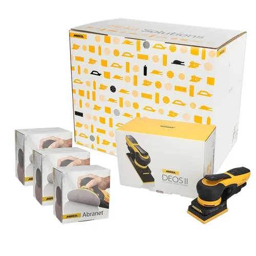 A Mirka DEOS II sander set featuring the sander, several boxed sanding pads, and a large branded box in the background, all displayed on a white surface.