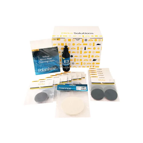 A car polishing kit featuring a box, polish bottle, microfibre cloth, polishing pads, and sandpapers arranged neatly in front of the box.