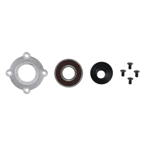 Four automotive parts arranged on a white background: a circular metal flange, a brown-sealed bearing, a black rubber ring, and four black screws.