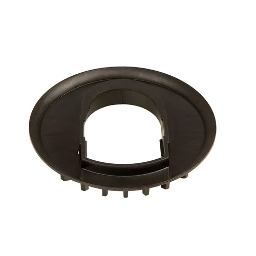 Black plastic circular insert with a large central hole and several small protruding tabs on the bottom edge, designed for fitting into a round opening, likely a component for mounting or securing objects.