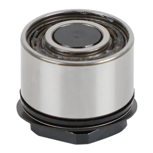 A close-up of a cylindrical metal bearing with a shiny outer casing and a black base, commonly used in machinery or automotive applications.