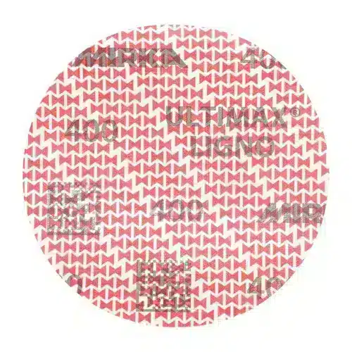 A round, 150mm foil safety seal featuring a repeating red triangle pattern is used to securely seal containers for freshness and protection. This type of seal is similar to those found on the Mirka Ultimax Ligno 150mm PSA Sanding Discs (100), ensuring a tight, reliable closure.