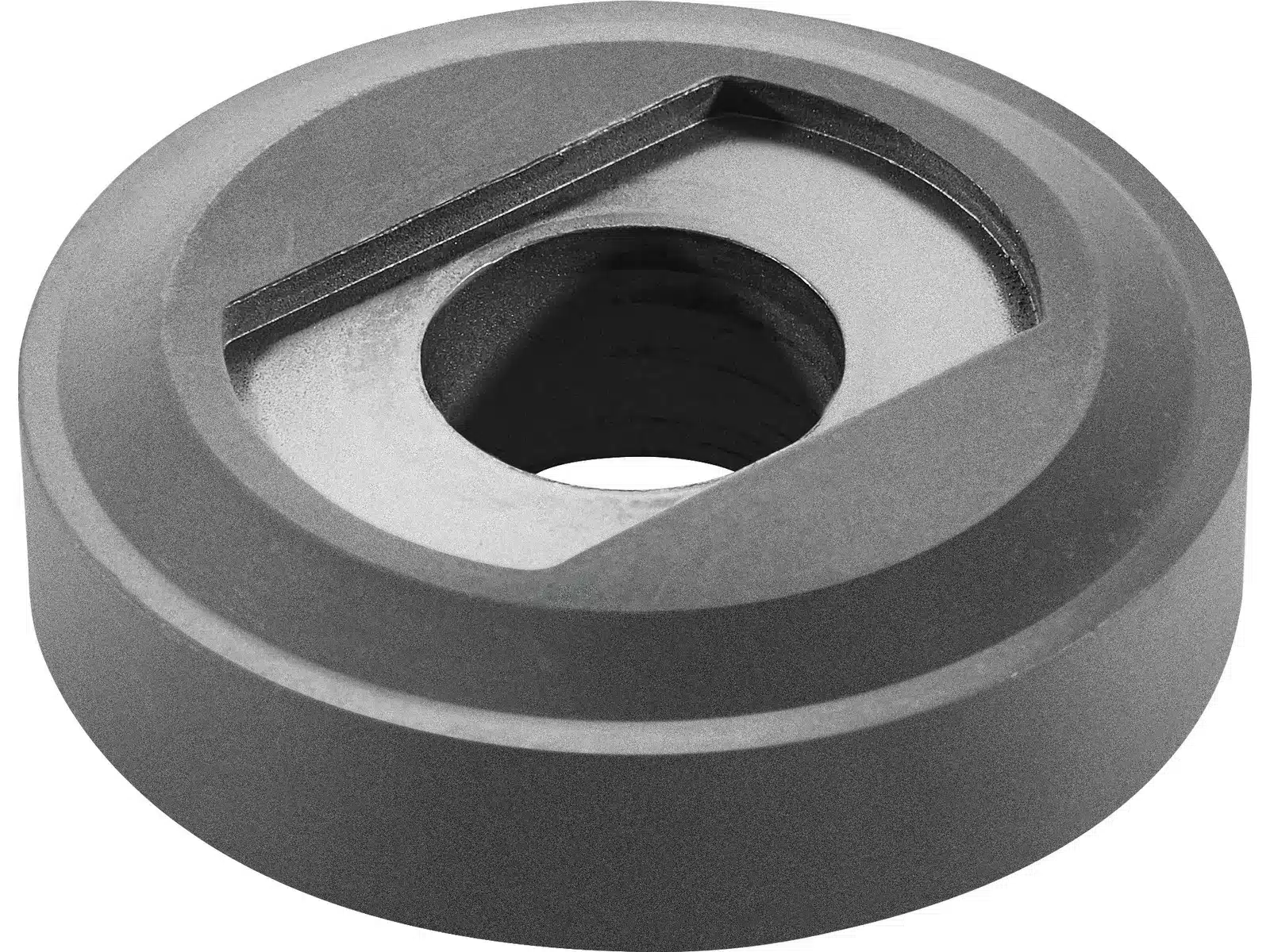 Round, metallic cutting insert with a central hole and an angled, bevelled edge. The surface is smooth and grey, with a distinct flat facet on one side near the inner hole.
